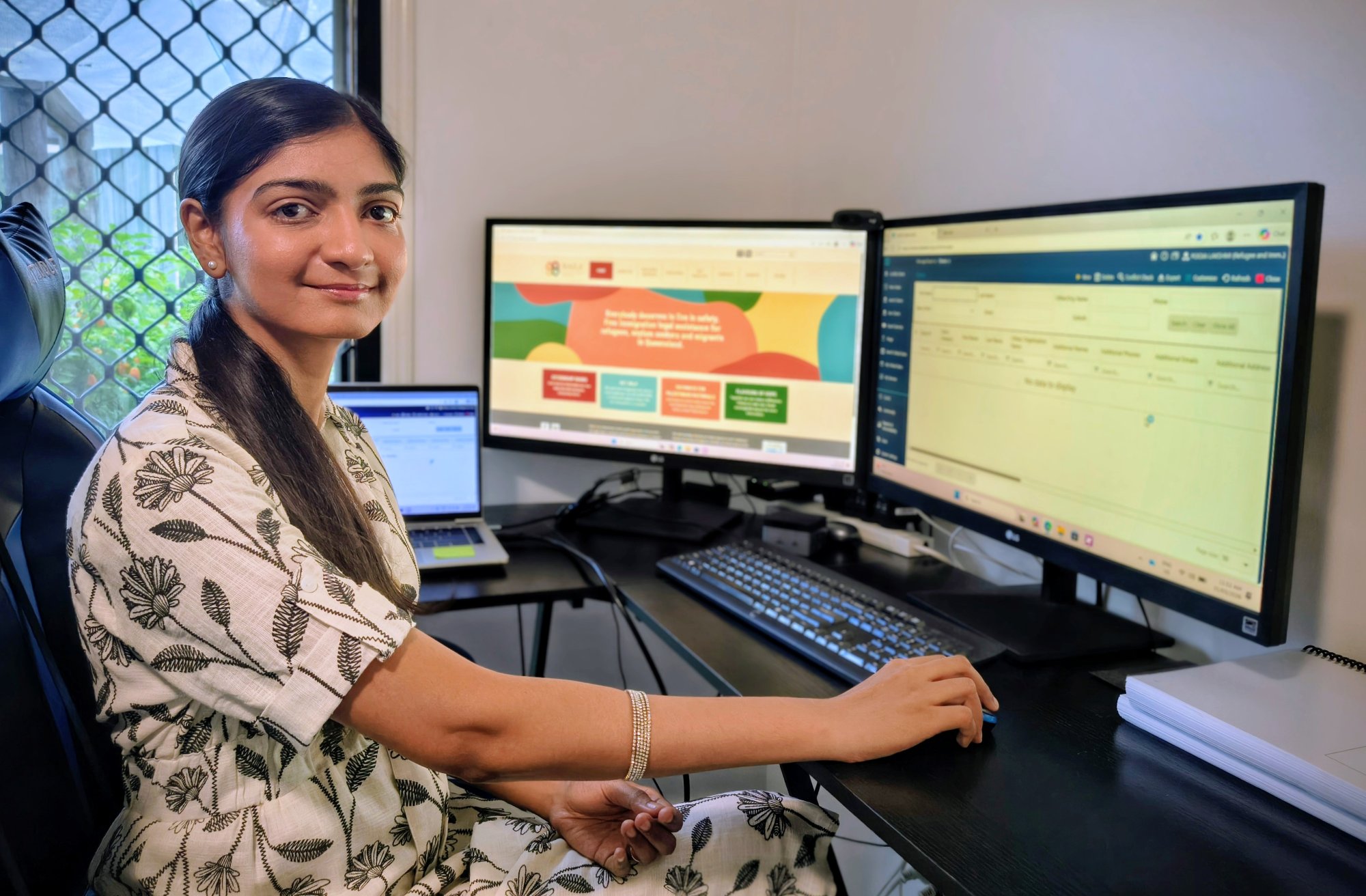 Pooja, founder of Pooja Pacific Partners, at her desk